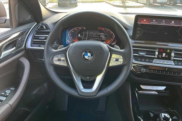 used 2025 BMW X4 car, priced at $51,991
