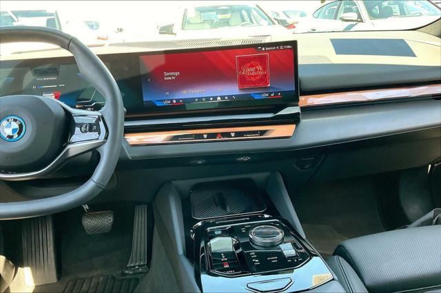 used 2024 BMW i5 car, priced at $52,995