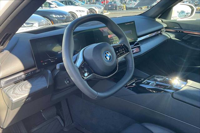 used 2024 BMW i5 car, priced at $56,996