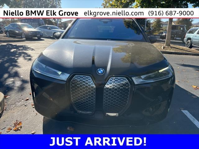 used 2023 BMW iX car, priced at $57,610