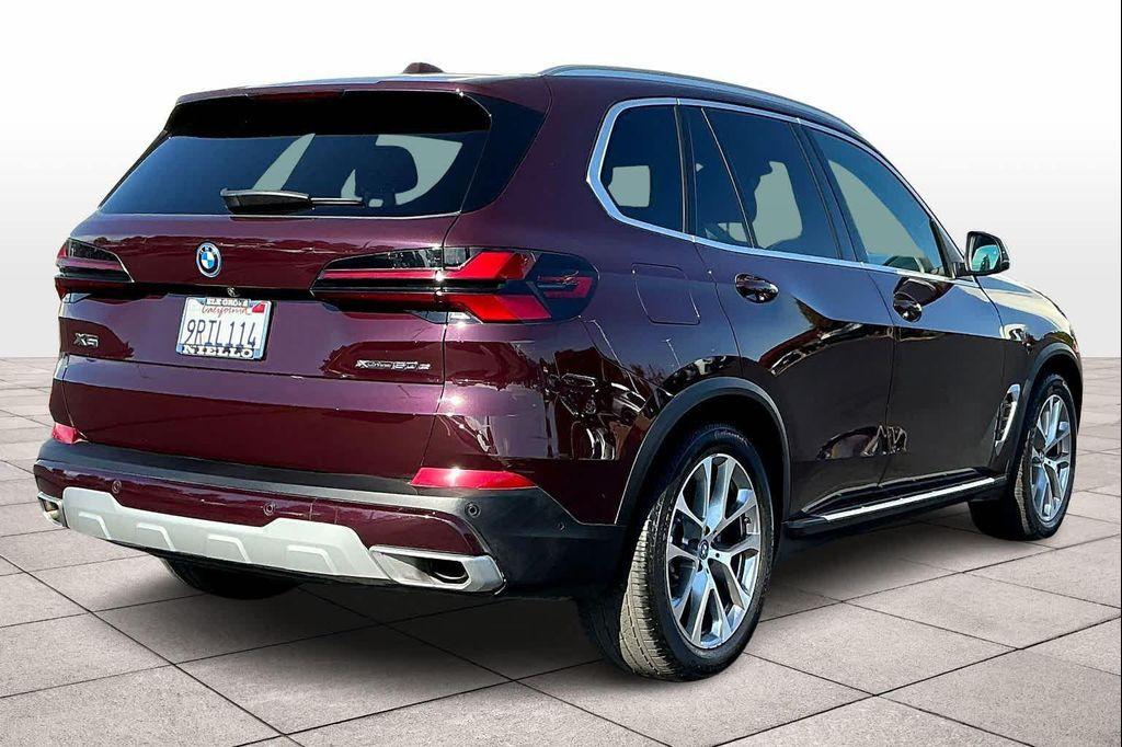 used 2025 BMW X5 PHEV car, priced at $63,396