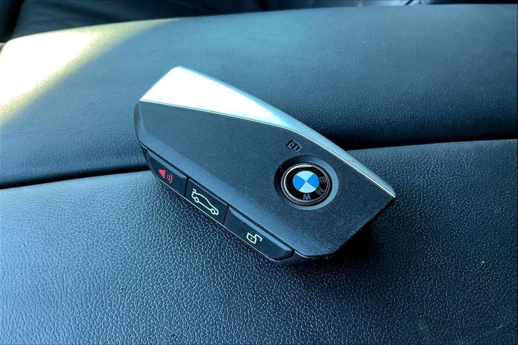 used 2025 BMW X5 PHEV car, priced at $63,396