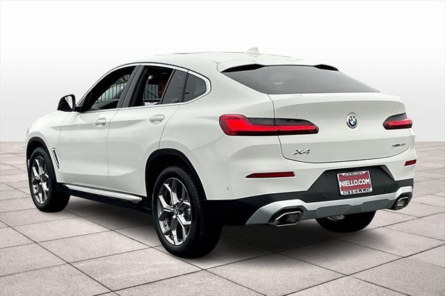 used 2024 BMW X4 car, priced at $52,392