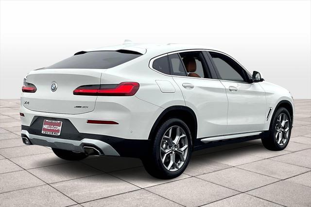 used 2024 BMW X4 car, priced at $52,392