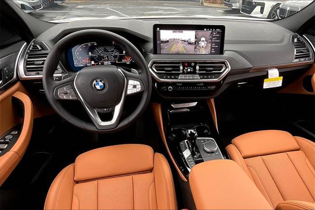 used 2024 BMW X4 car, priced at $52,392