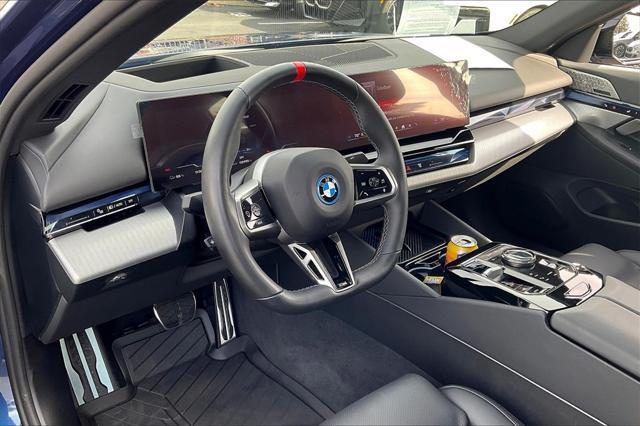 used 2024 BMW i5 car, priced at $79,997