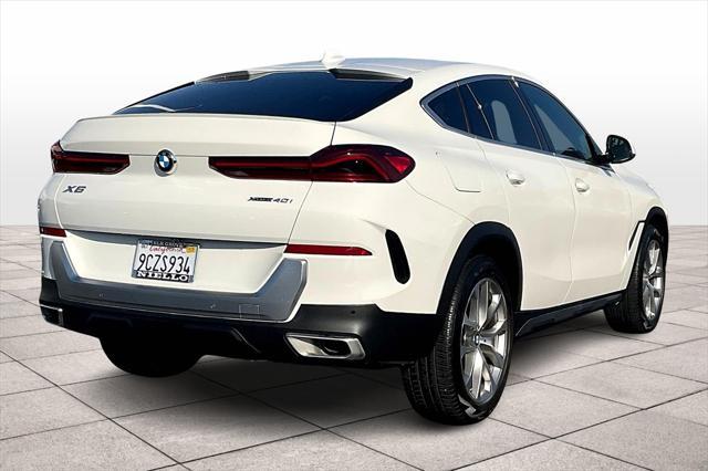 used 2023 BMW X6 car, priced at $56,396