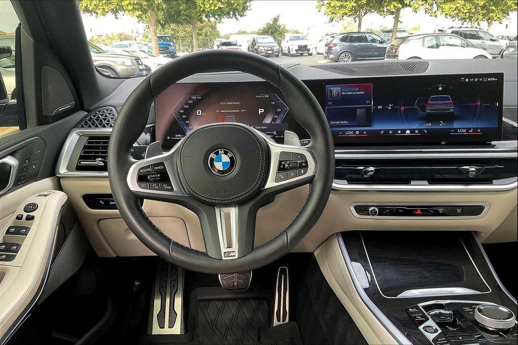 used 2025 BMW X5 car, priced at $90,012