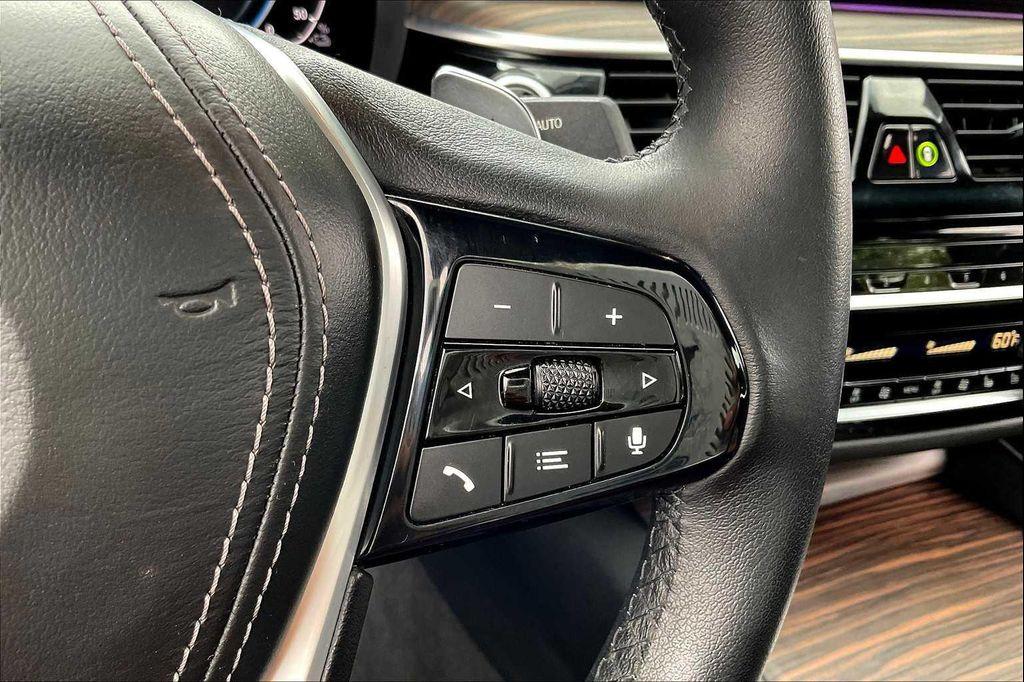 used 2023 BMW 530e car, priced at $39,799