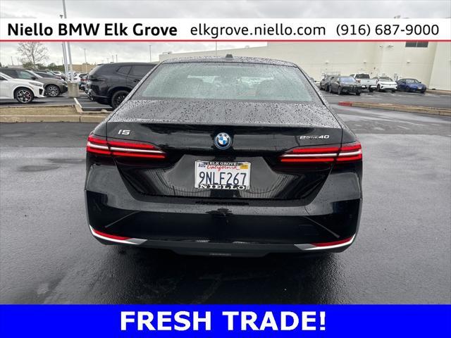 used 2024 BMW i5 car, priced at $59,079