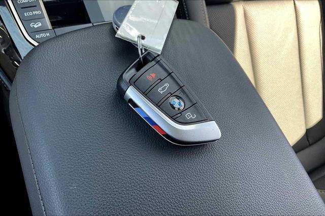 used 2025 BMW X4 car, priced at $67,997
