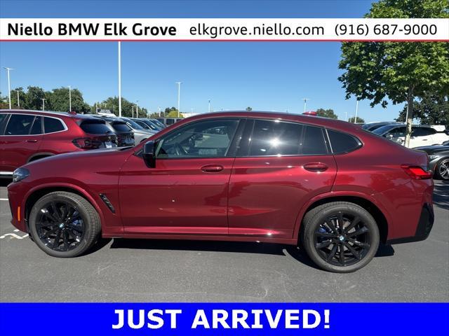 used 2025 BMW X4 car, priced at $67,997