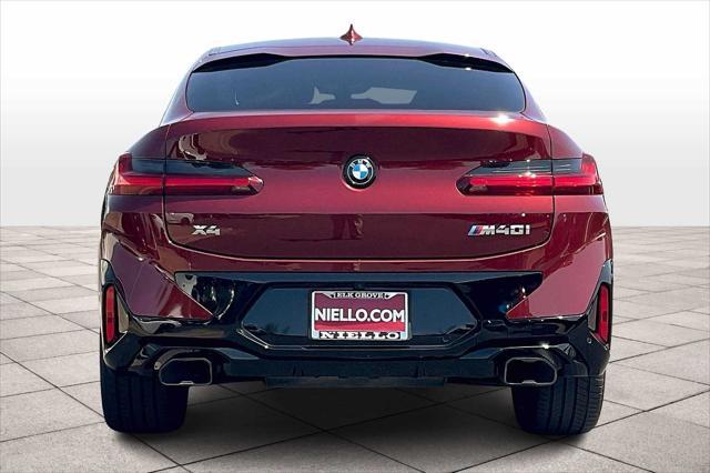 used 2025 BMW X4 car, priced at $67,997