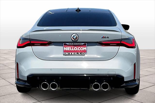 used 2023 BMW M4 car, priced at $70,397