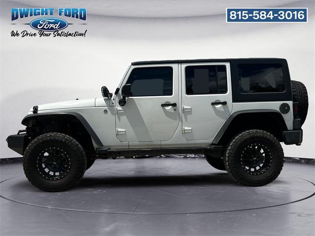 used 2014 Jeep Wrangler Unlimited car, priced at $17,293