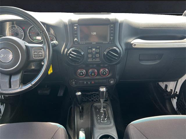 used 2014 Jeep Wrangler Unlimited car, priced at $17,293
