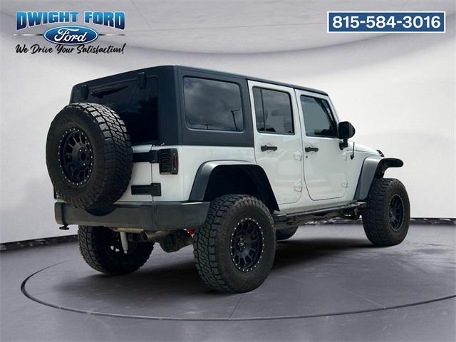 used 2014 Jeep Wrangler Unlimited car, priced at $17,293