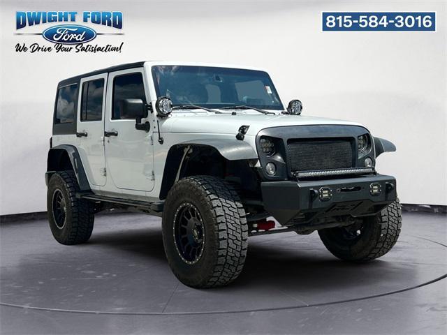 used 2014 Jeep Wrangler Unlimited car, priced at $17,293