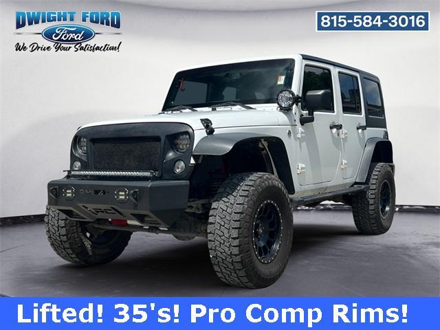 used 2014 Jeep Wrangler Unlimited car, priced at $19,187