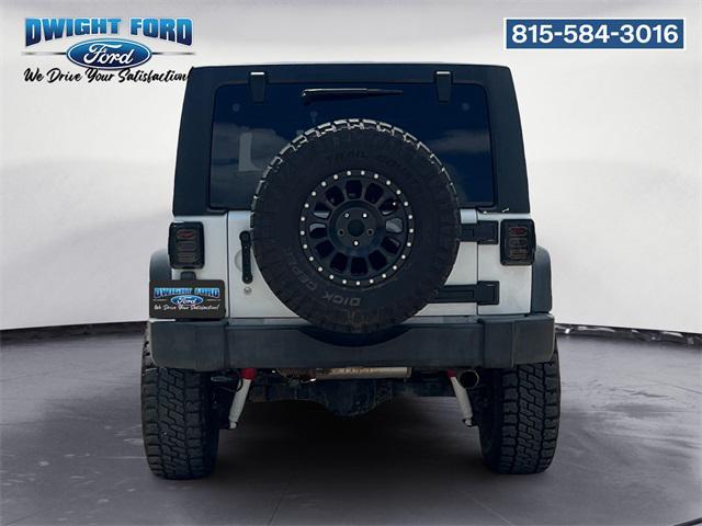 used 2014 Jeep Wrangler Unlimited car, priced at $17,293