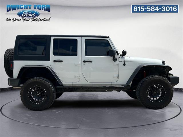 used 2014 Jeep Wrangler Unlimited car, priced at $17,293