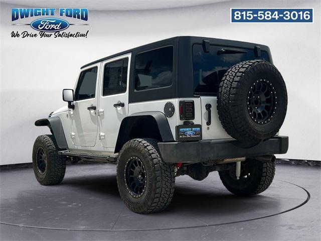 used 2014 Jeep Wrangler Unlimited car, priced at $17,293
