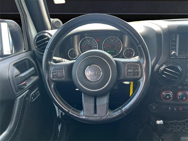 used 2014 Jeep Wrangler Unlimited car, priced at $17,293