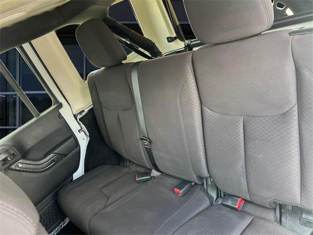 used 2014 Jeep Wrangler Unlimited car, priced at $17,293