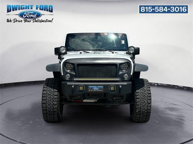 used 2014 Jeep Wrangler Unlimited car, priced at $17,293