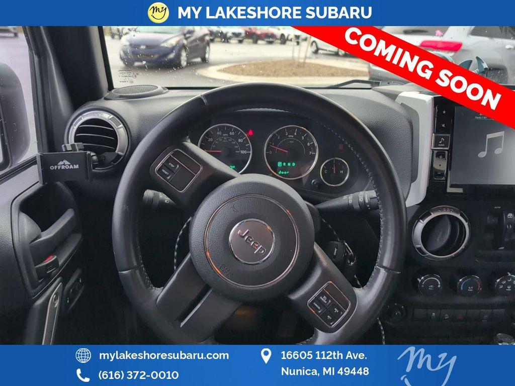 used 2015 Jeep Wrangler Unlimited car, priced at $18,480