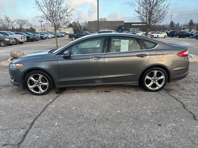 used 2014 Ford Fusion car, priced at $6,997