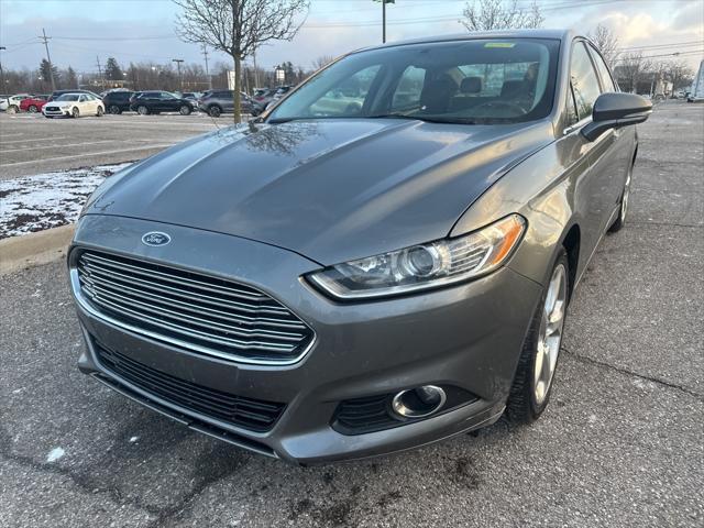 used 2014 Ford Fusion car, priced at $6,997