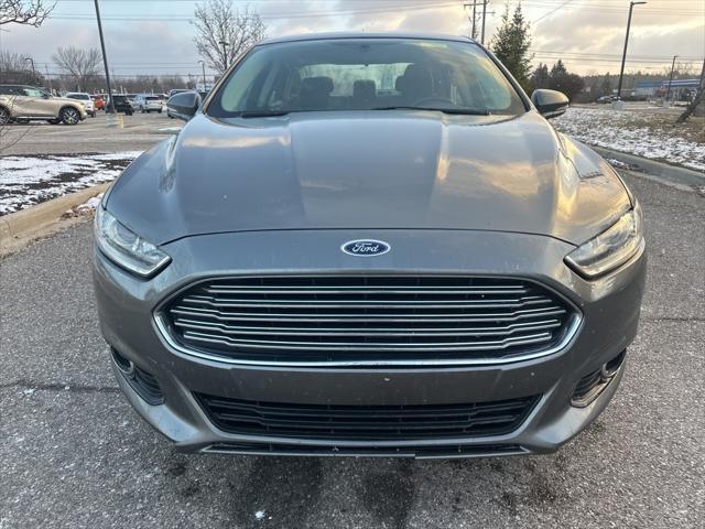 used 2014 Ford Fusion car, priced at $6,997