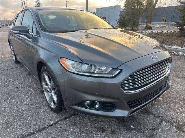 used 2014 Ford Fusion car, priced at $6,997