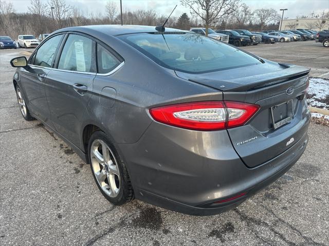 used 2014 Ford Fusion car, priced at $6,997