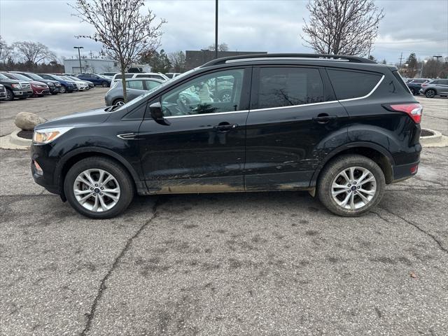 used 2018 Ford Escape car, priced at $12,995