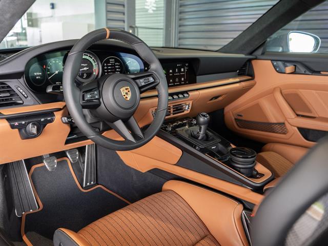 used 2024 Porsche 911 car, priced at $674,888