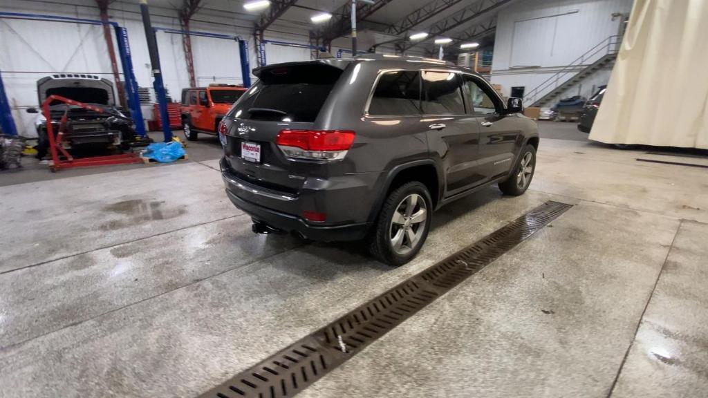 used 2014 Jeep Grand Cherokee car, priced at $14,999