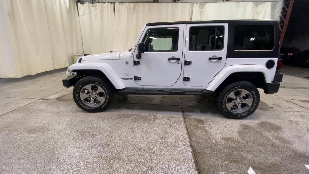 used 2013 Jeep Wrangler Unlimited car, priced at $18,499