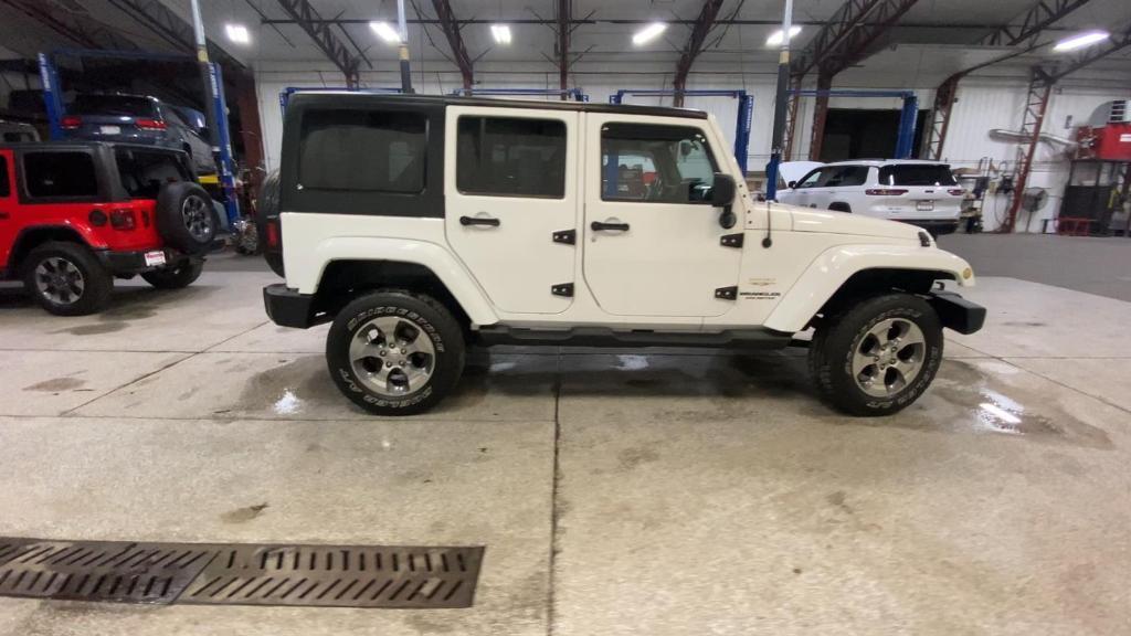 used 2013 Jeep Wrangler Unlimited car, priced at $18,499