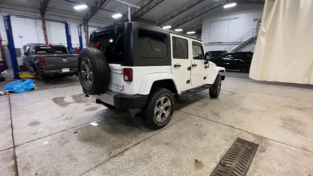 used 2013 Jeep Wrangler Unlimited car, priced at $18,499