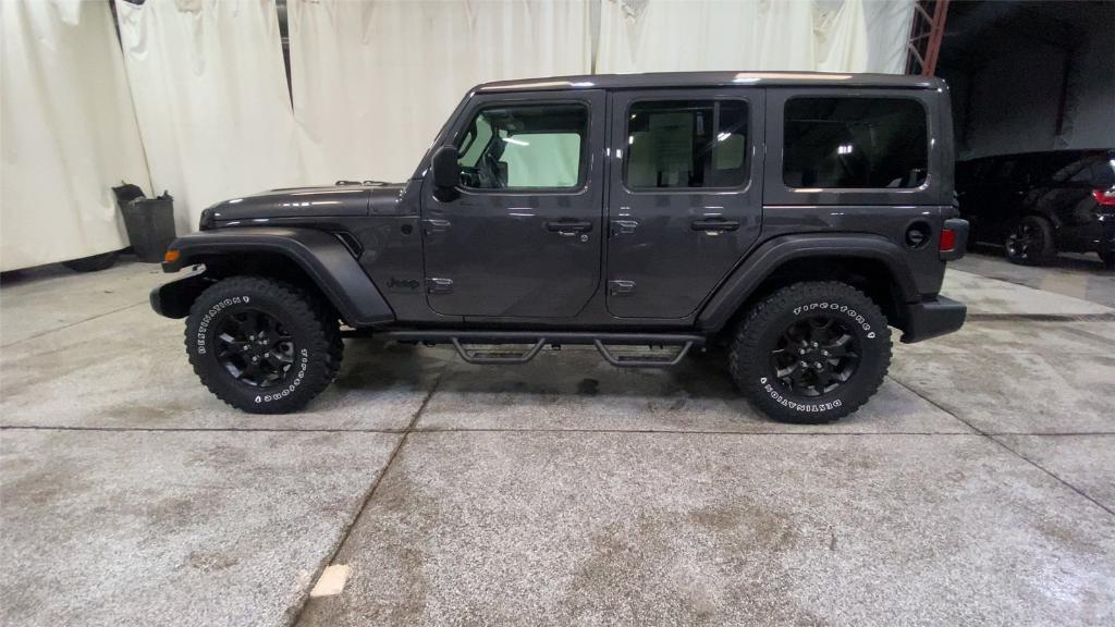 used 2021 Jeep Wrangler Unlimited car, priced at $34,499