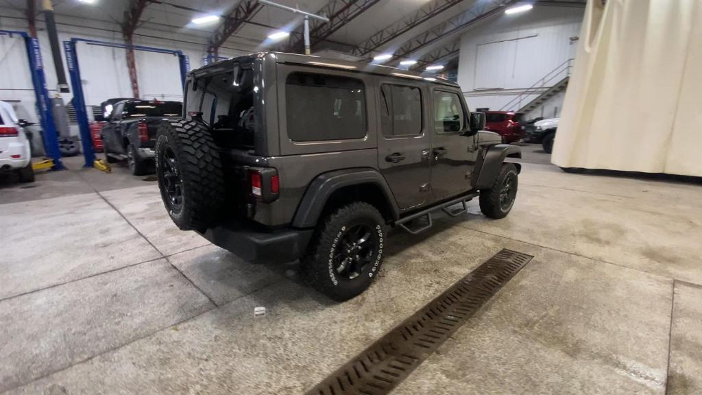 used 2021 Jeep Wrangler Unlimited car, priced at $34,499