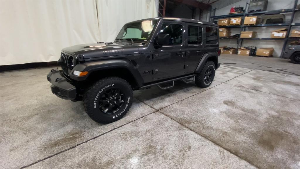 used 2021 Jeep Wrangler Unlimited car, priced at $34,499