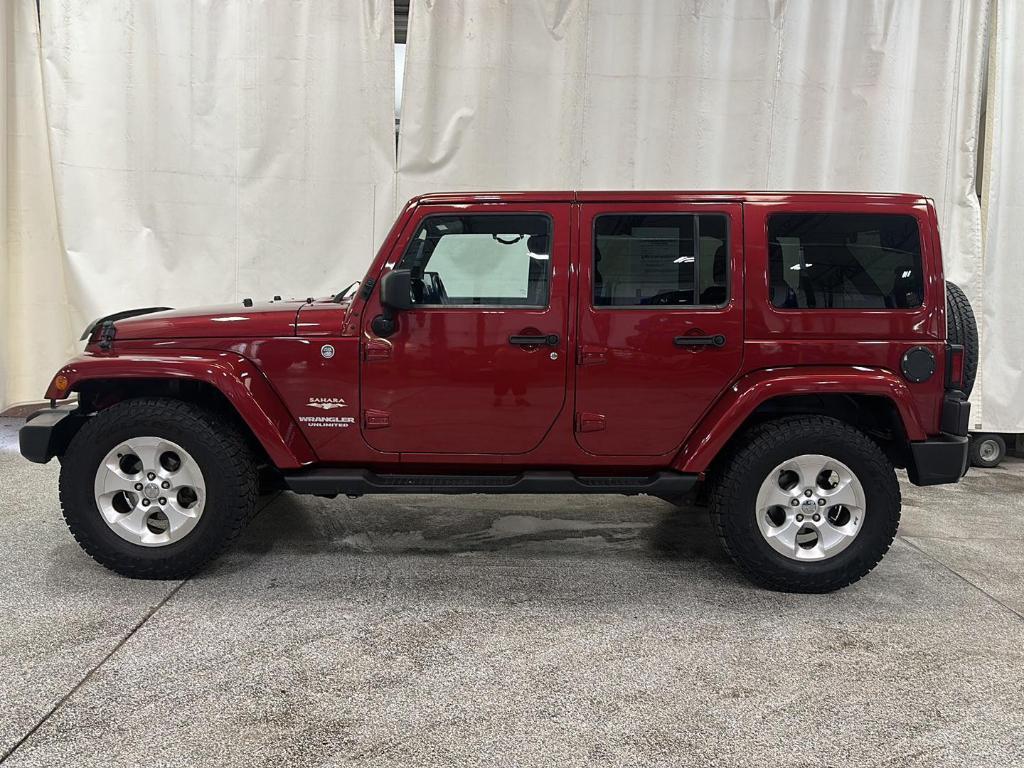 used 2013 Jeep Wrangler Unlimited car, priced at $14,499
