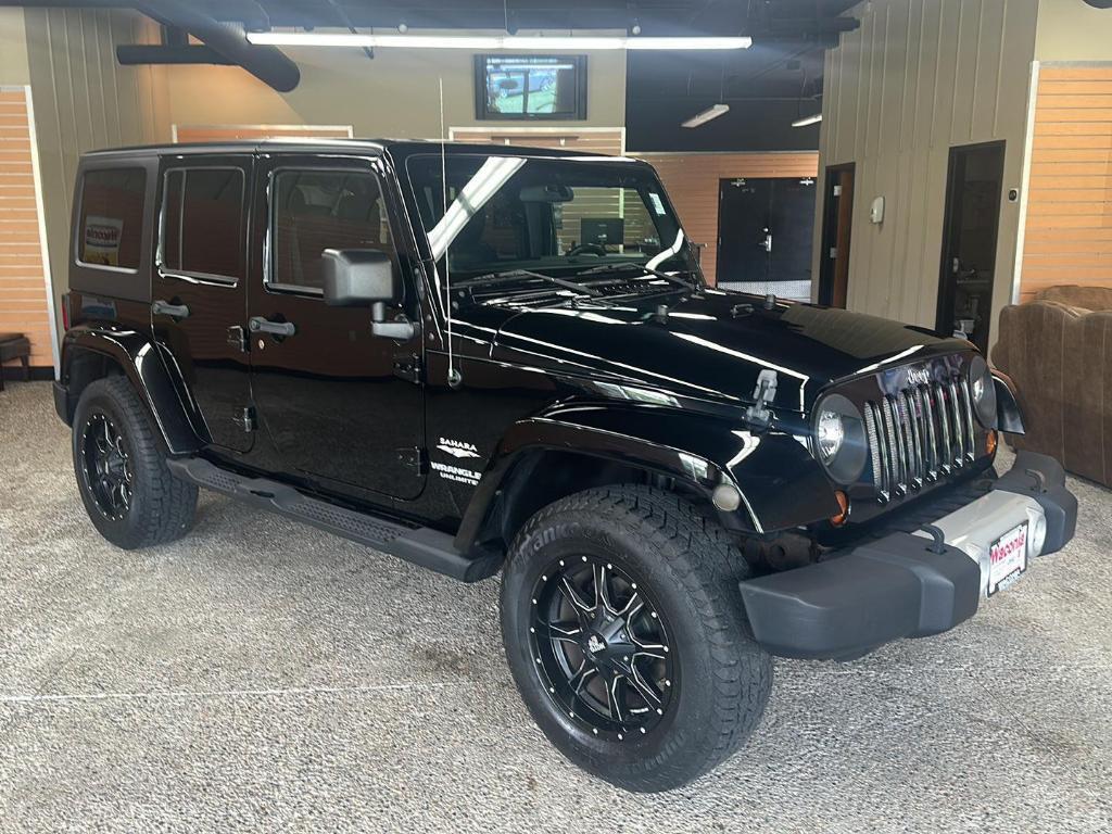 used 2011 Jeep Wrangler Unlimited car, priced at $13,988