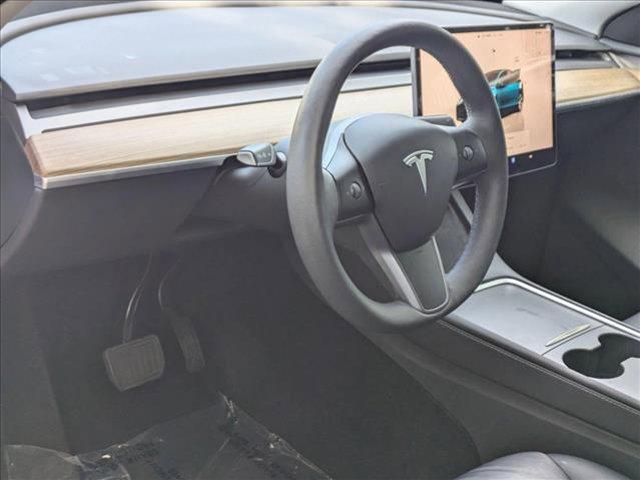 used 2023 Tesla Model Y car, priced at $30,149