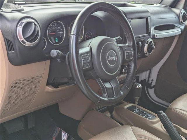 used 2017 Jeep Wrangler Unlimited car, priced at $24,249