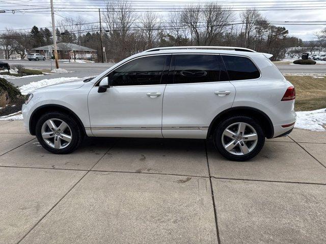 used 2012 Volkswagen Touareg Hybrid car, priced at $11,750