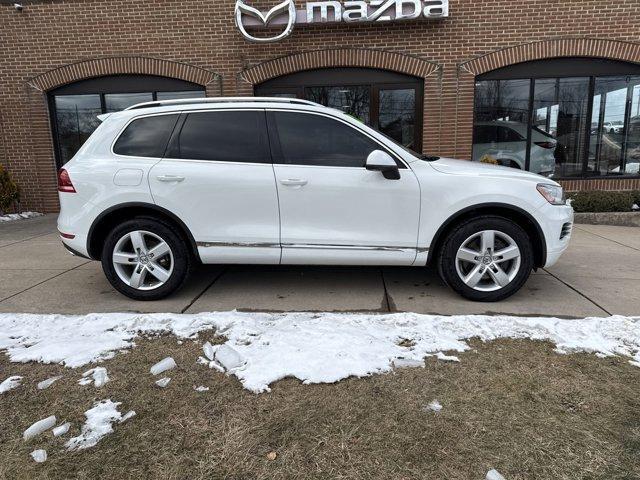 used 2012 Volkswagen Touareg Hybrid car, priced at $11,750